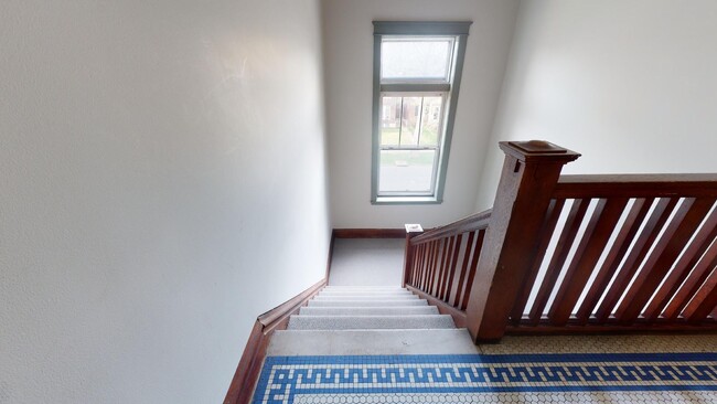 Stairs to unit - 5803 Waterman Blvd