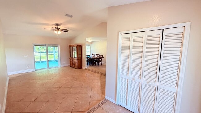 Building Photo - Bright & Spacious 3/2 Home with Huge Yard + Screened Patio — Lawn Care Included!