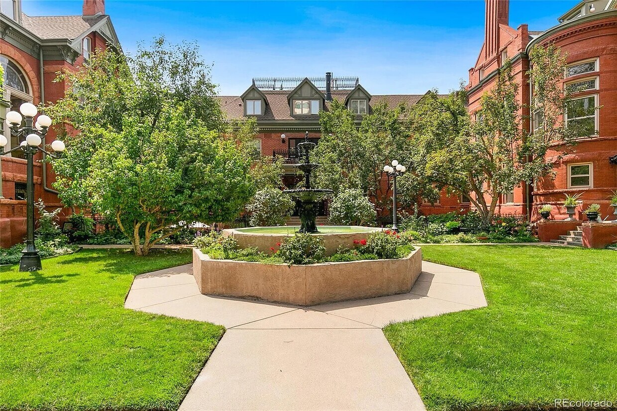 Exterior with beautiful courtyard - 1165 N Pennsylvania St