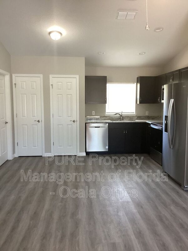 Building Photo - 6577 SW 140th Pl