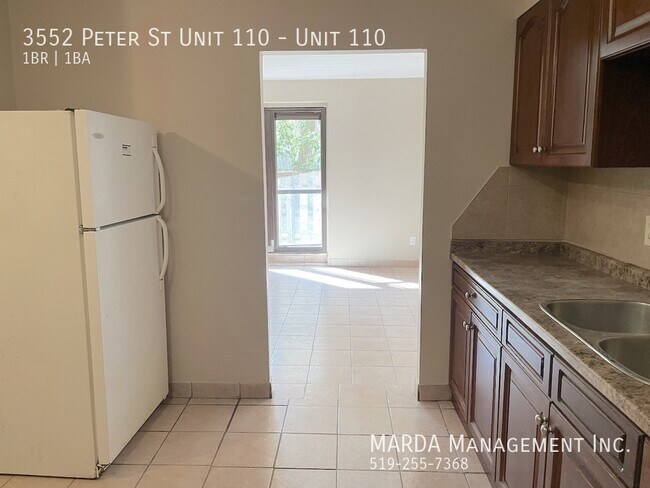 Photo du bâtiment - SPACIOUS 1 BED/1 BATH MAIN FLOOR UNIT! WEST WINDSOR INCLUSIVE!