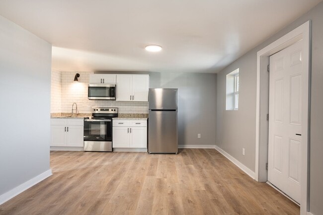 Building Photo - Discover Modern Living at Genesis Apartmen...