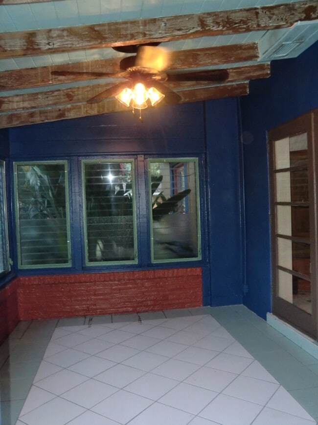 Front enclosed room with AC / new windows and beige paint not shown - 1101 NE 12th Ave