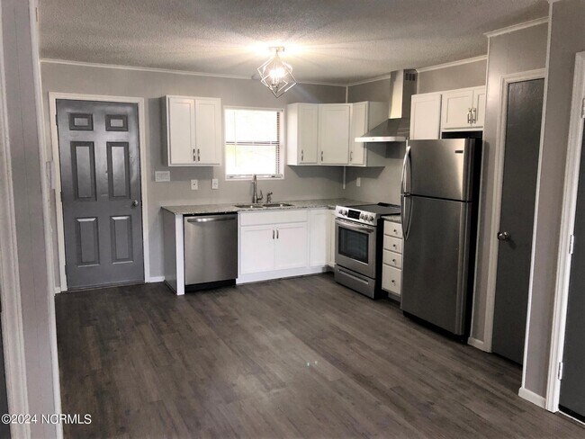 Foto del edificio - 100 Ravenwood Dr