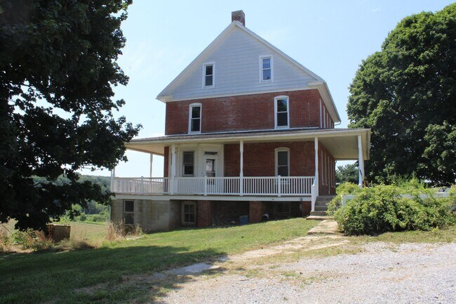 Building Photo - Classic Farmhouse with Country Appeal