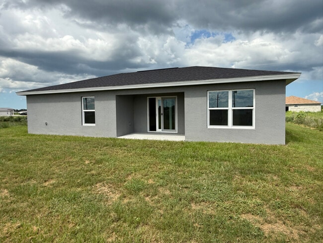 Building Photo - 7038 Lotus Cir
