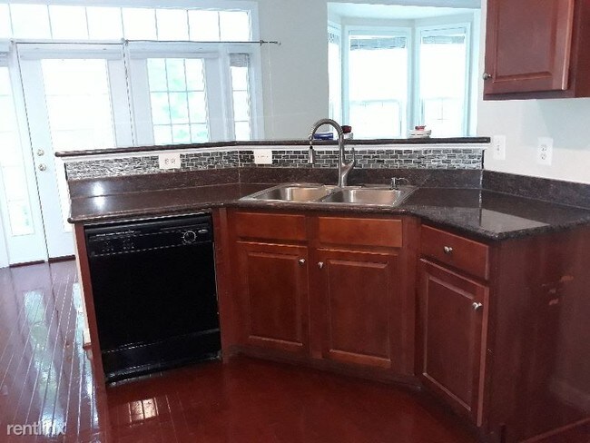 Foto del edificio - 3528 Carriage Walk Ln