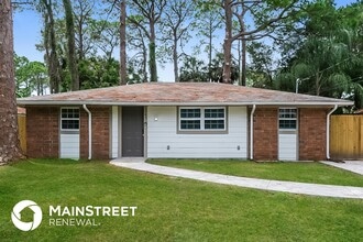 Building Photo - 7145 Pinewood Dr