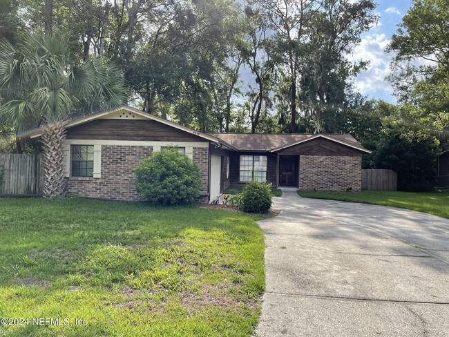 Building Photo - 5217 Secluded Oaks Ln