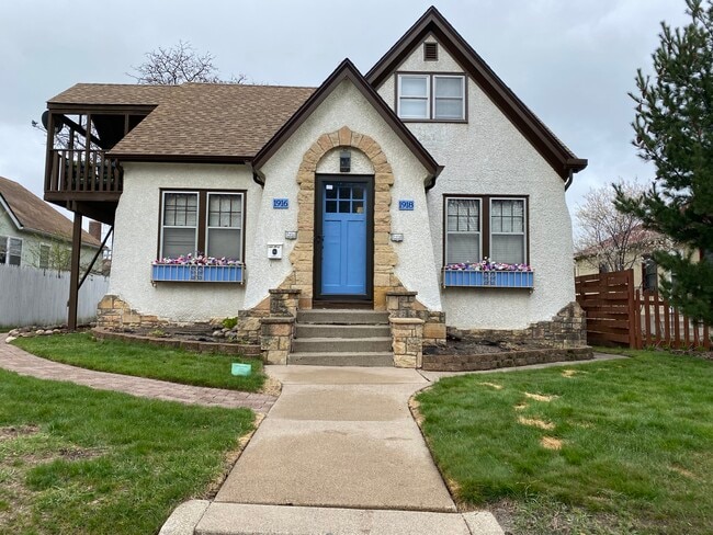 The available unit is on the top floor of this home. - 1916 Polk St NE