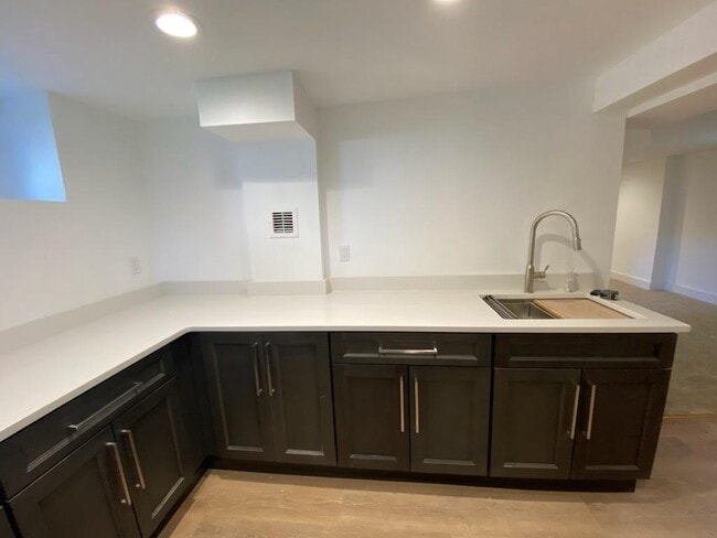 New appliances, cabinet & laminate flooring - 1112 Ocean Ave