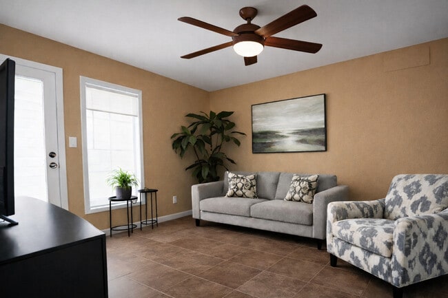 1BR, 1BA_560sqft Livingroom - The Point at Windmill Lakes