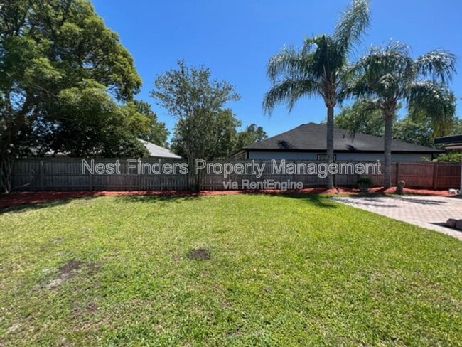 Foto del edificio - 11201 Wandering Oaks Dr