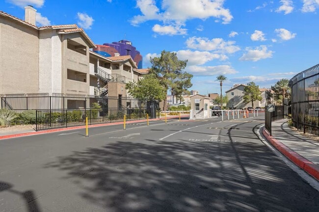 Building Photo - AWESOME 2 BEDROOM  CONDO NEAR STRIP W/ VIEWS AND OVERLOOKS POOLS!!!!!!