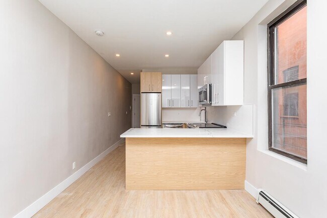 Building Photo - 319 Malcolm X Blvd