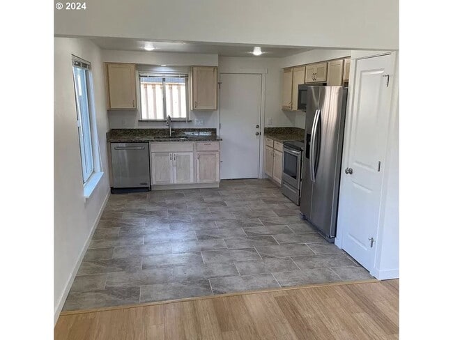 Photo - Bright and Airy Home with Stainless Steel Kitchen, Vaulted Ceilings & Washer + Dryer