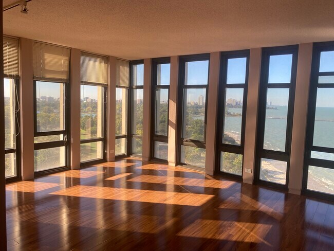 Living room with lake view - 6700 S South Shore Dr