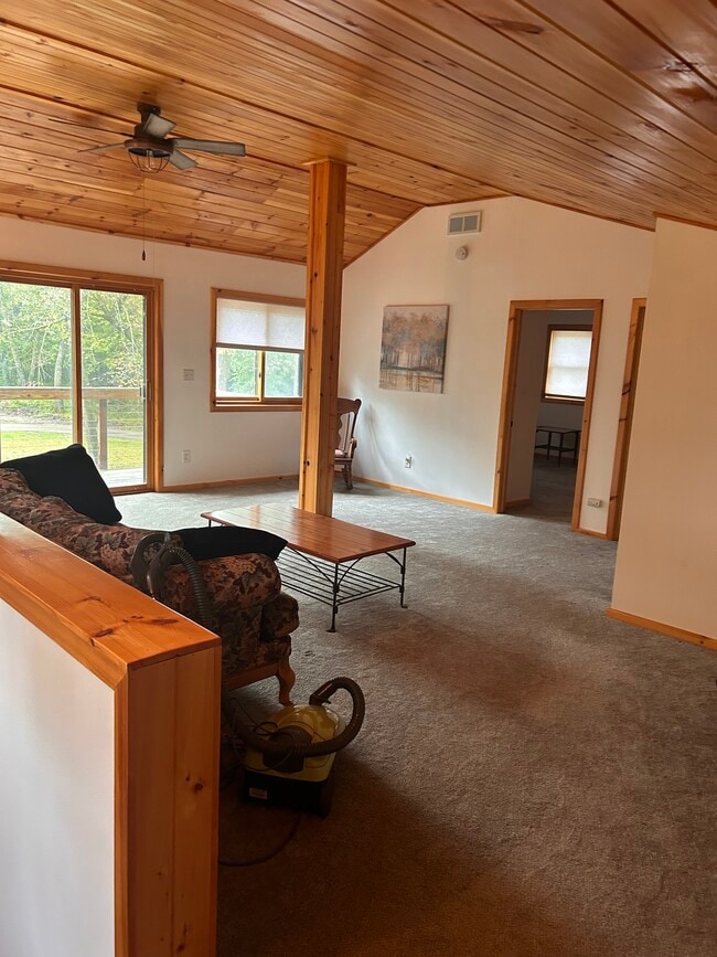 Living room and 2 bedrooms with full bathroom on 2nd floor. - 12275 62nd St NE