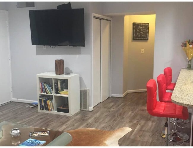 Picture from the living room, kitchen on the right and exit to the balcony on the left - 180 Talbott St