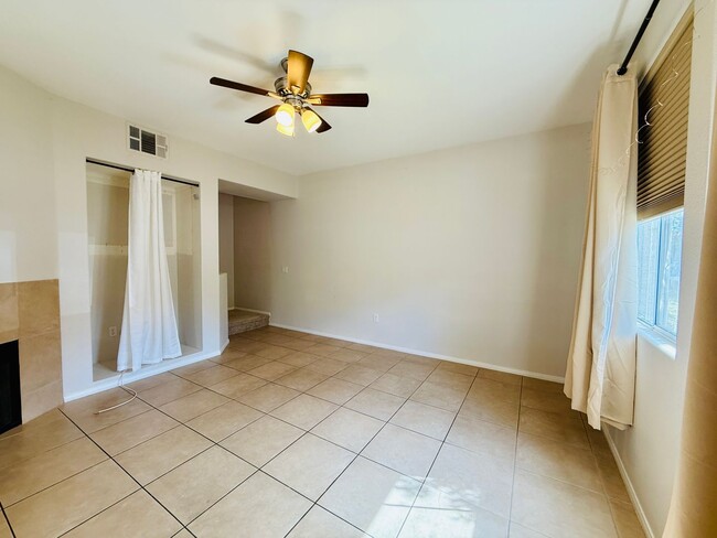 Building Photo - Immaculate and Inviting Two-Story Condo in...
