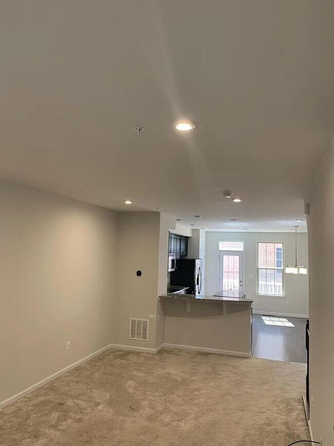 Building Photo - Modern 2BR + Office Townhome with Garage &...