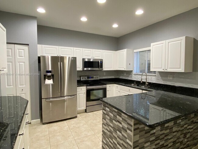 Building Photo - 8775 SW 221st Terrace