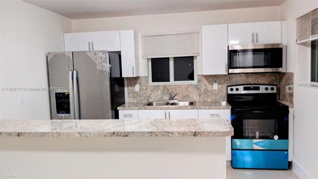 Building Photo - 3 br, 2 bath House - 3055 NW 58th Street #1
