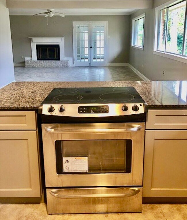 Building Photo - Location! Just updated! open kitchen,slab ...