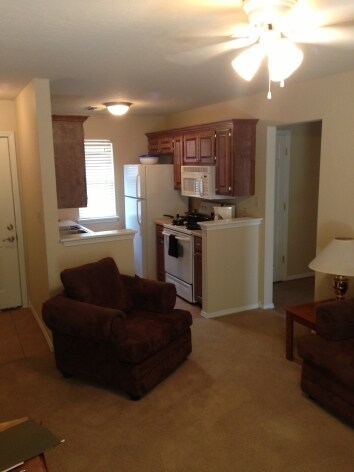Furnished kitchen - Metropolitan Apartments