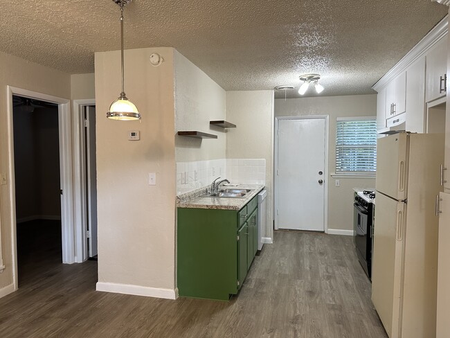 View into Kitchen and eating area - 817 E Lindsey St