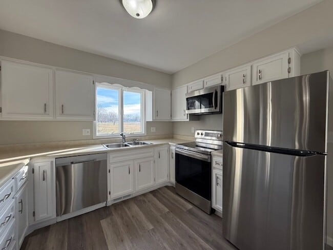 Building Photo - 3 Bedroom with Finished Walk Out Basement!