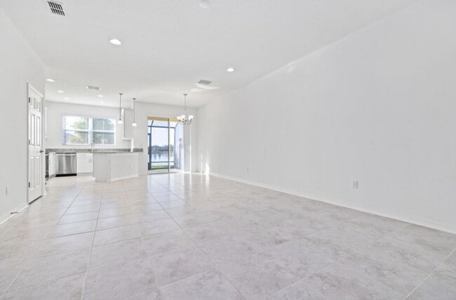 Building Photo - "Charming 3-Bedroom Retreat with Lake View & Pool on Southwell Lane, Wesley Chapel!"