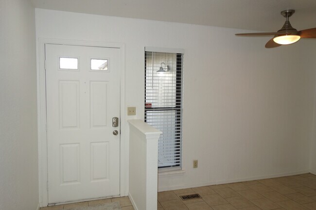 Inside the front door w/ dining area on right - 6604 S Utica Pl