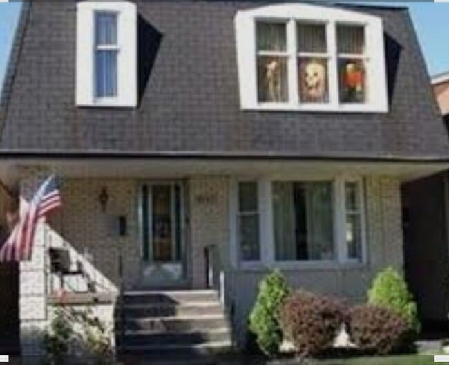 Building Photo - 6042 S Kolmar Ave