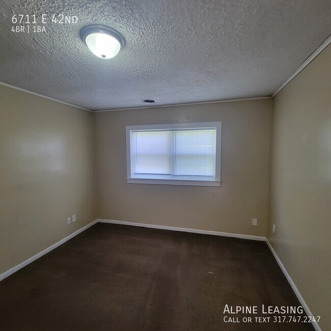 Building Photo - 6711 E 42nd-