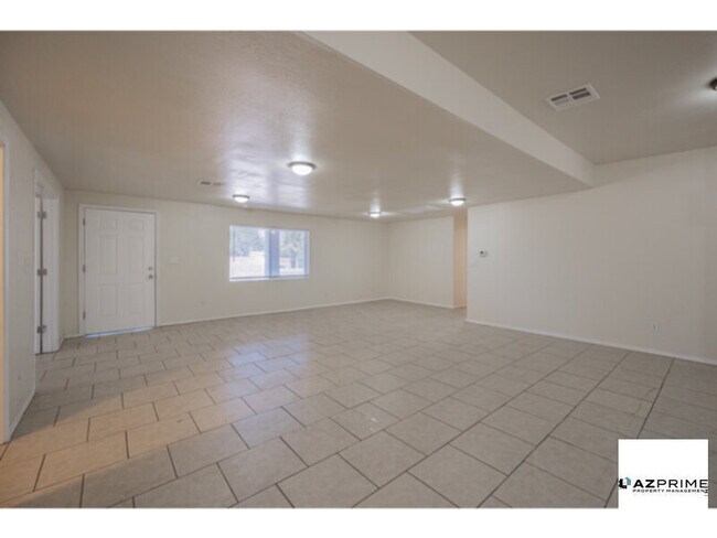 Building Photo - Experience comfort and space in this Custo...