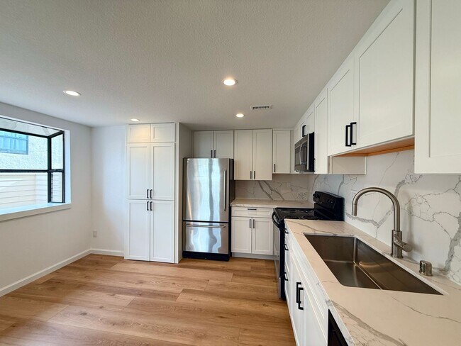 Building Photo - Experience refined coastal living in the h...