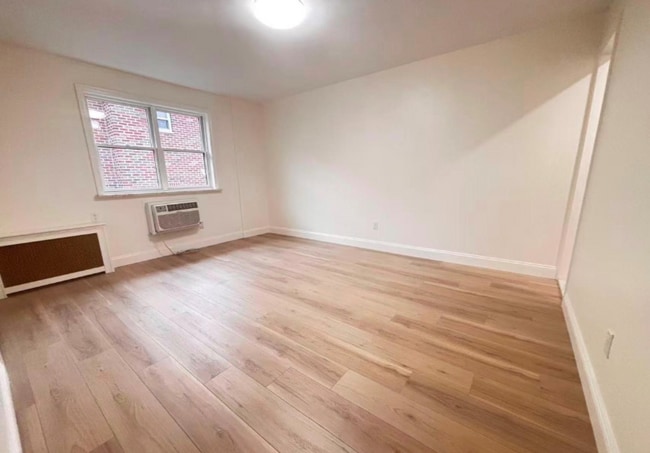 Building Photo - 214-27 38th Ave