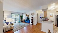 Located at 1811 Sibley Rd in Augusta, Georgia, this single-story residence offers a well-organized and inviting layout throughout. The open living room is a standout feature, showcasing warm hardwood flooring, a textured ceiling, and large sliding glass doors that flood the space with natural light and provide direct access to an outdoor area. The living area flows seamlessly into a dedicated dining space adjacent to the kitchen, making it well-suited for everyday living and entertaining.

The galley-style kitchen is thoughtfully appointed with rich wood cabinetry, dark granite countertops, and black appliances, including a range and refrigerator. Ample counter and storage space lines both sides of the kitchen, maximizing functionality.

The bedrooms are carpeted for comfort and each features a ceiling fan with light fixture and windows that bring in natural light. The bathroom is clean and straightforward, featuring a combined tub and shower, a wood vanity with granite countertop, and hardwood flooring.

Throughout the home, white walls provide a neutral backdrop that enhances brightness, while consistent hardwood flooring in the main living areas ties the spaces together cohesively. The overall ambiance is warm, functional, and move-in ready.