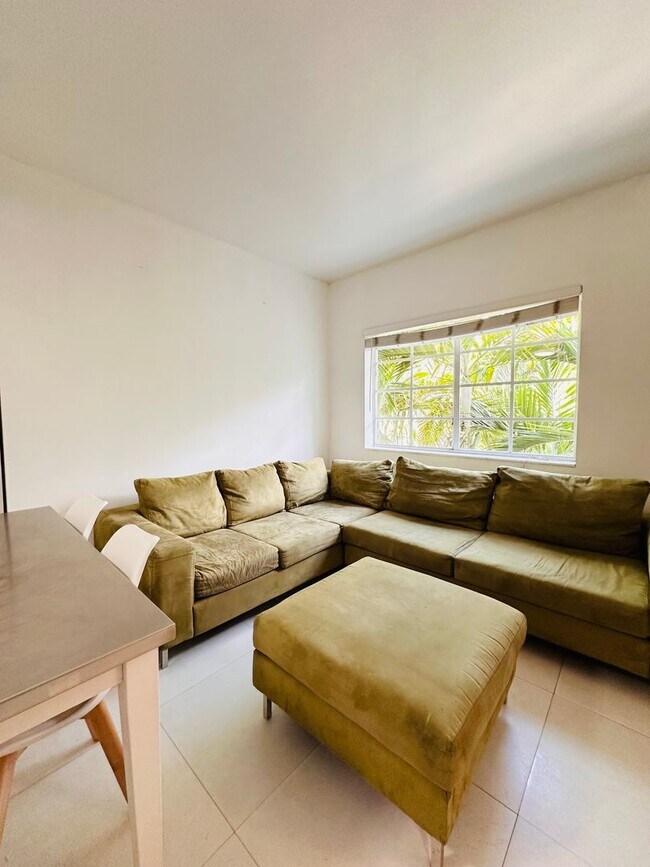 Building Photo - Bright and furnished 1/1 in classy remodel...