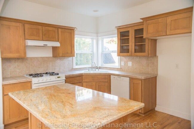 Building Photo - Urban Farm! Lovely 4 Bedroom Eastside Home.