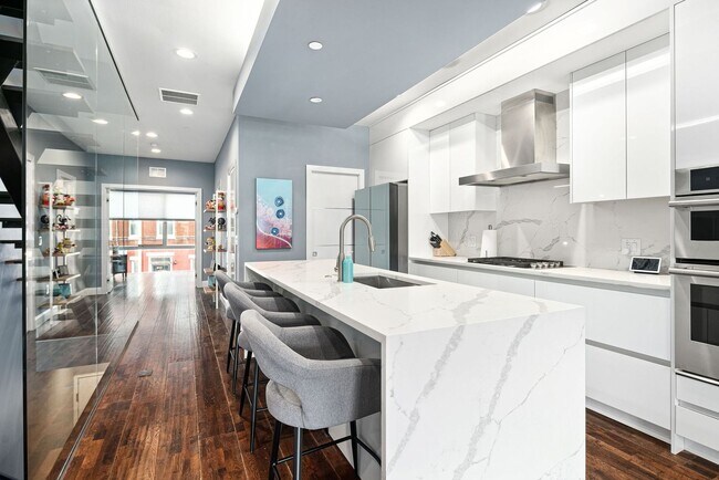 Building Photo - Premium Francisville Condo with Roofdeck!