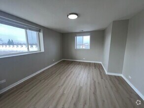 Building Photo - 5655 W Fullerton Ave