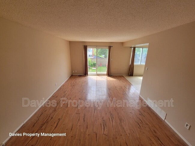 Building Photo - 7115-7180 80 Ave NW