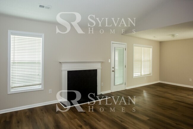 Foto del edificio - This home exudes a cheerful and welcoming charm!