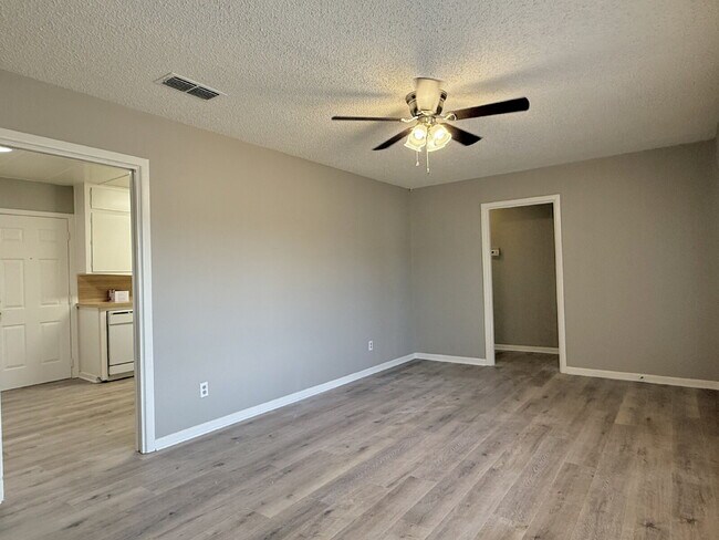 Building Photo - Fresh Paint, New Floors, and a Fresh Start!