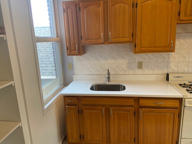 Brand new granite top with new stainless steel sink and faucet - 127 19th St