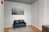 Located at 44 Bromfield Street in the heart of Boston's Downtown Crossing neighborhood, this thoughtfully designed studio offers a smart, efficient layout that makes excellent use of its footprint. The space features light hardwood flooring and elevated ceilings with a distinctive paneled finish that adds an architectural character throughout.

The open living and sleeping area is generously proportioned for a studio, with large windows that invite natural light and offer views of the surrounding cityscape. Multiple closets provide ample storage, and a wall-mounted HVAC unit ensures year-round comfort.

The kitchen is well-appointed with white shaker cabinetry, white quartz countertops, a classic subway tile backsplash, and a full suite of stainless steel appliances including a refrigerator, electric range, built-in microwave, and dishwasher — making it fully functional for everyday cooking.

The bathroom is finished with grey marble-style tile on both the floor and shower surround, complemented by a glass-enclosed walk-in shower with a pebble stone base and navy cabinetry at the vanity, giving it a clean, contemporary aesthetic.

With three closets offering exceptional storage for its size, this studio is a practical and stylish option in one of Boston's most walkable and vibrant urban neighborhoods.
