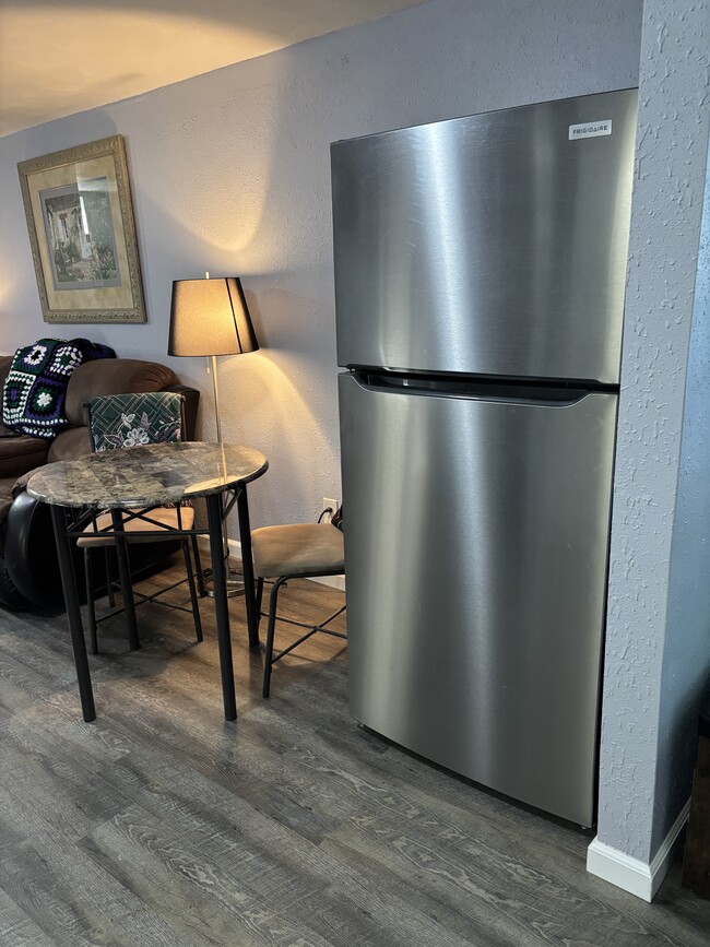 Bistro table/Full size refrigerator - 126 E College Ave