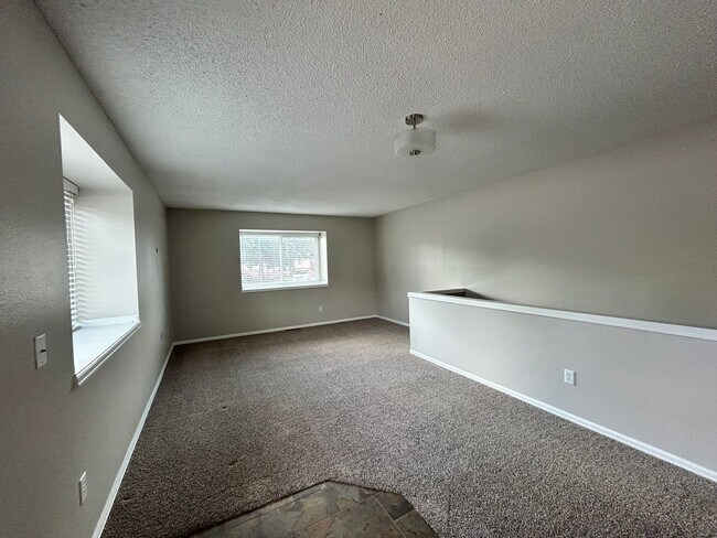 Building Photo - Spacious 3BR Duplex w/ Garage, Workshop, Large Backyard & Patio